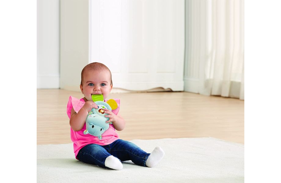 Vtech Little Friendlies Happy Hippo Teether Blue baby with teether in mouth